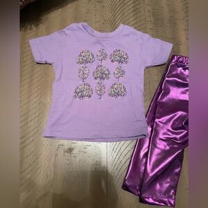 Mardi Gras beaded tree shirt and shiny purple pants. ⚜️